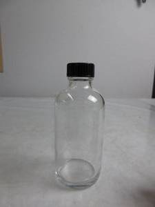 lot 69 image: 12 SMALL GLASS BOTTLES MULTI-USE NEW, UNSURE OF OUNCES