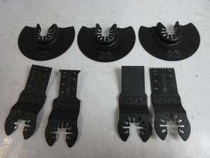 lot 71 image: RYOBI Multi-Material Oscillating Blade Set 7 PIECES,  MISSING 1 CUTTER, 1 HAS NUMBERS FADING, OPEN BOX
