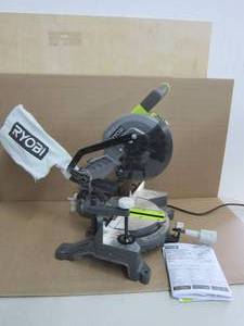 lot 135 image: RYOBI 7-14 in. Miter Saw 9 AMP. Light Weight With Blade - USED, Works, No Box.
