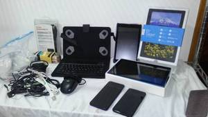 lot 335 image: Tablets, Phones, chargers and more.