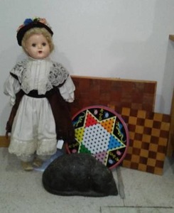 lot 417 image: Unique handcrafted Lead Rat, Vintage Doll, game boards.