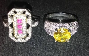 lot 437 image: Pink  and Yellow Gemstone Rings