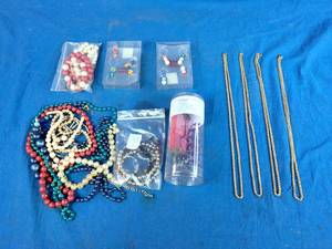 Lot of Miscellaneous Costume Jewelry and 3 Gold Tone Chains.