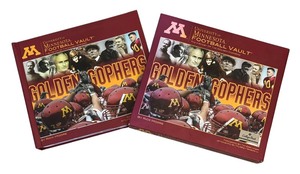 lot 62 image: Boxed University of Minnesota Football Vault Book by Rick Moore