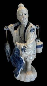 lot 6 image: Vintage Asian Blue and White Fisherman Figurine