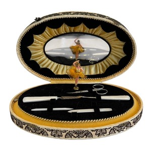 lot 66 image: Vintage Swiss Musical Movement Manicure Set
