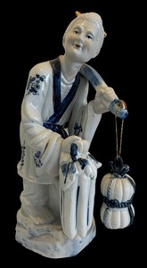 lot 71 image: Asian Fisherman Figurine