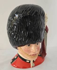 lot 36 image: Royal Doulton The Guardsman Character Jug