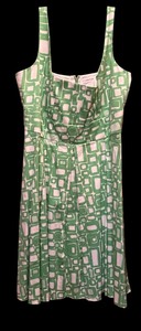 lot 463 image: Spring is Coming  Beautiful Sleeveless Green and White Calvin Klein Top