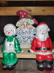 lot 415 image: Two Vintage Shelf Sitters & Santa Tin Decor