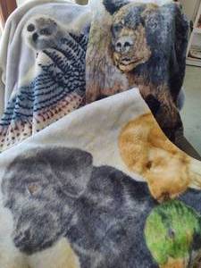 lot 145 image: Lot of Fleece and Quilted Wildlife Blankets