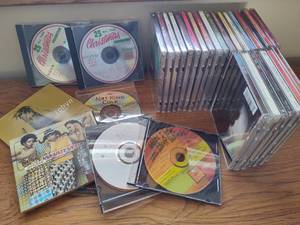 lot 312 image: Lot of Assorted Cds & Carrying Case