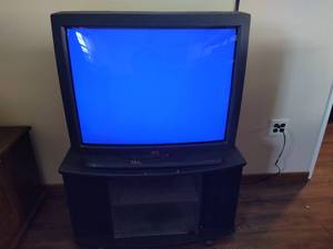 lot 305 image: JVC Tube TV & TV Stand on Wheels