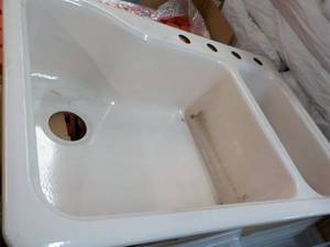 lot 239 image: Cast Iron Sink 33 x 22...