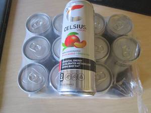 lot 144 image: 12 pack Celsius Peach mango Green T...