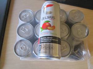 lot 145 image: 12 pack Celsius Peach mango Green T...