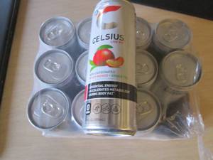 lot 146 image: 12 pack Celsius Peach mango Green T...