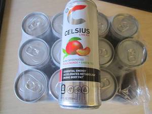 lot 148 image: 12 pack Celsius Peach mango Green T...