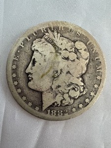 lot 19 image: 1882 MORGAN SILVER DOLLAR - S