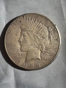 lot 21 image: 1923 PEACE SILVER DOLLAR - S