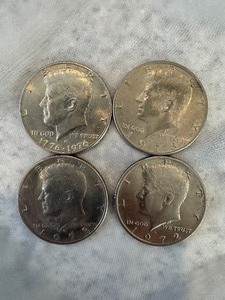 lot 36 image: MIXED LOT OF 4 EISENHOWER HALF DOLLAR