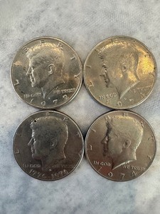 lot 37 image: MIXED LOT OF 4 EISENHOWER HALF DOLLAR