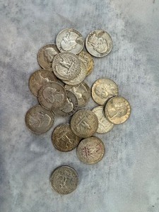 lot 41 image: LOT OF 18 MIXED SILVER QUARTERS