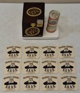 lot 26 image: Cigar Box Full of Treasures (12) Member of Hamms B.B.D.B Coasters (1) Cusano Aged 18 Years Cigar Box (Empty) & (1) Mini Budweiser Can with 2 Golf Balls Inside (Unopened) View Photos