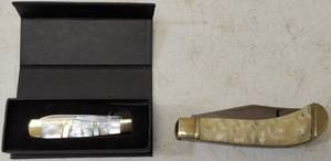 lot 48 image: (1) Whitetail Cutlery Knife - Pearl Finish (Larger Knife) (1) Steel Warrior - Pearl Finish (In Box) View Photos