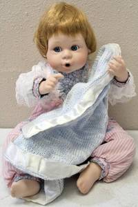 lot 56 image: Danbury Mint - Vintage Amy Thumb Sucking Porcelain Doll with Blanket - 9 Sitting