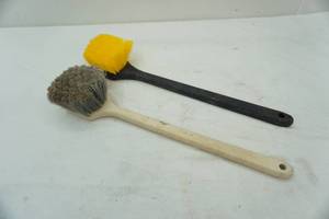 lot 75 image: long handled scrub brushes