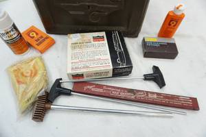 lot 152 image: ammo can with gun cleaning equipment