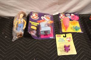 lot 21 image: Collection of Vintage Ghostbusters and Toy Story Figures