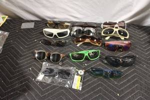lot 51 image: Assorted Collection of 12 Sunglasses in Varied Styles
