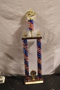 lot 55 image: Large 1994 Motorcycle Racing Trophy with American Flag Design