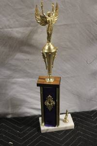 lot 57 image: Golden Trophy with 1st Place Plaque and Angel Figure