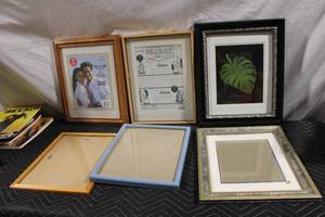 lot 105 image: Collection of 5 Picture Frames in Various Sizes and Styles