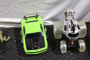 lot 157 image: Collection of RC Toy Vehicles Featuring Sports Car and All-Terrain Truck