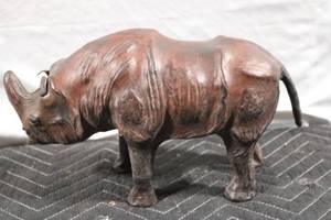 lot A-187 image: Rustic Wooden Rhinoceros Sculpture