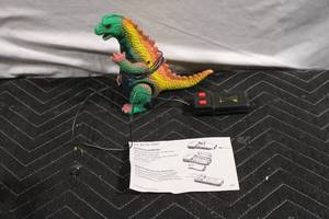 lot 199 image: Vintage Radio Shack Wire Controlled Dinosaur Toy