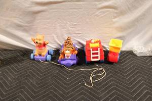 lot 289 image: Set of 4 Pull-Along Toys Including Pooh and Tigger