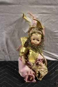 lot 294 image: Vintage Porcelain Clown Doll with Gold and Pink Costume