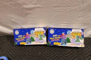 lot 305 image: GE 100 Light Net-Style Outdoor Set with Multicolored Bulbs, Set of 2