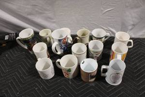 lot 363 image: Collection of 14 Assorted Coffee Mugs with Holiday and Graphic Designs