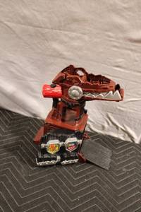 lot 371 image: Dinosaur-Themed Toy Playset with Rotating Tower