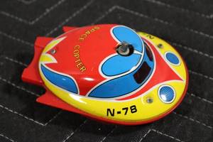 lot A-374 image: Vintage N-78 Space Copter Tin Toy