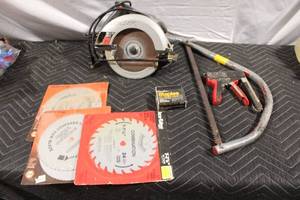 lot 402 image: Skilsaw Circular Saw with Blades and Handsaw Set