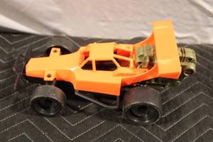 lot 434 image: Vintage Orange Toy Race Car with Removable Engine