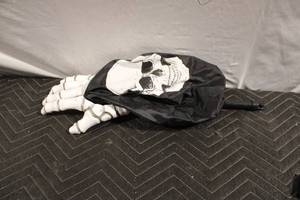 lot 456 image: Skeleton Hand Candy Holder with Skull Design