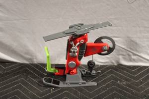 lot 462 image: Red Model Helicopter Desk Toy with Adjustable Parts